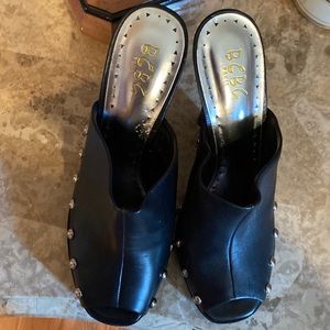 BCBG/Paris Medium heels with silver rivets. Black, open toed Size 8. Never worn.